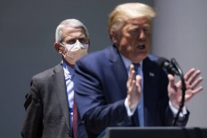 Anthony Fauci e Trump (Foto: Samuel Corum/The New York Times)