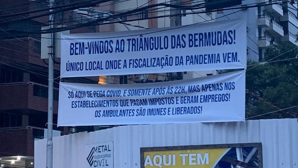 Faixa estendida por donos de bares e restaurantes no Triângulo das Bermudas, em Vitória. Foto: Reprodução