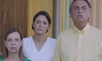 O presidente e candidato à reeleição pelo PL, Jair Bolsonaro, gravou vídeo ao lado da primeira-dama, Michelle Bolsonaro, e da representante de Juan Guaidó no Brasil, María Teresa Belandria (à esquerda)