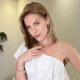 Apresentadora Ana Hickmann com um vestido branco posando para a foto. Foto: Reprodução/Instagram
