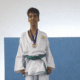 Paratleta de Karate Victor Luiz Bezerra no podium em primeiro lugar no campeonato brasileiro.