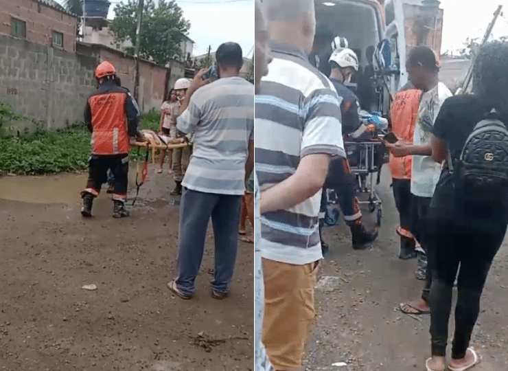 Menina sendo levada para ambulância