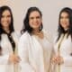 As especialistas em estética Vanessa Cabral e as suas filhas Gessica e Raquel Cabral posando juntas de jaleco branco para foto de divulgação