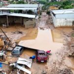 Carros e casas tomados pela lama causada pelas chuvas que atingiram o Sul do ES