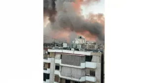  Fumaça e fogo de bombardeio visto da varanda da casa da brasileira, em Beirute. Foto - Lindaura Lianes Hijazi/Arquivo Pessoal