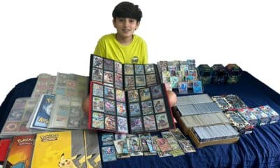 Enzo, 12 anos, exibe 5 mil cartas de Pokémon ao lado de relíquias do Império no Encontro Nacional de Multicolecionismo. Foto: Divulgação
