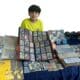Enzo, 12 anos, exibe 5 mil cartas de Pokémon ao lado de relíquias do Império no Encontro Nacional de Multicolecionismo. Foto: Divulgação