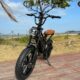 Bike elétrica na orla de Camburi, em Vitória
