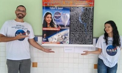 A estudante Bárbara Rezende Martinelli, ao lado do professor Luiz Gustavo Gomes, apresenta o projeto científico desenvolvido na Escola Estadual Irmã Maria Horta, em Vitória